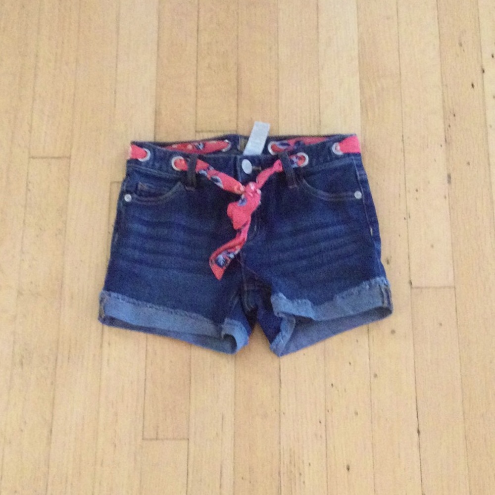 Justice denim shorts with built in belt.